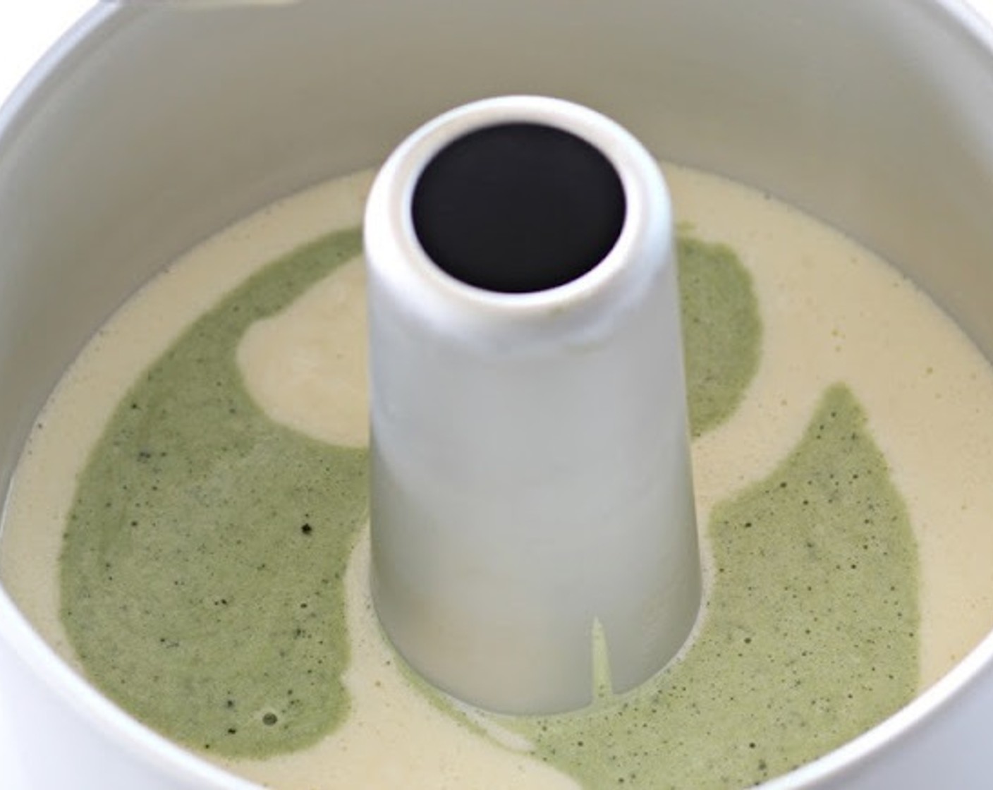 step 7 In another bowl make matcha paste: mix Matcha Powder (1 tsp) and Water (2 Tbsp). Add matcha paste into one portion of the batter, gently fold well with a rubber spatula.