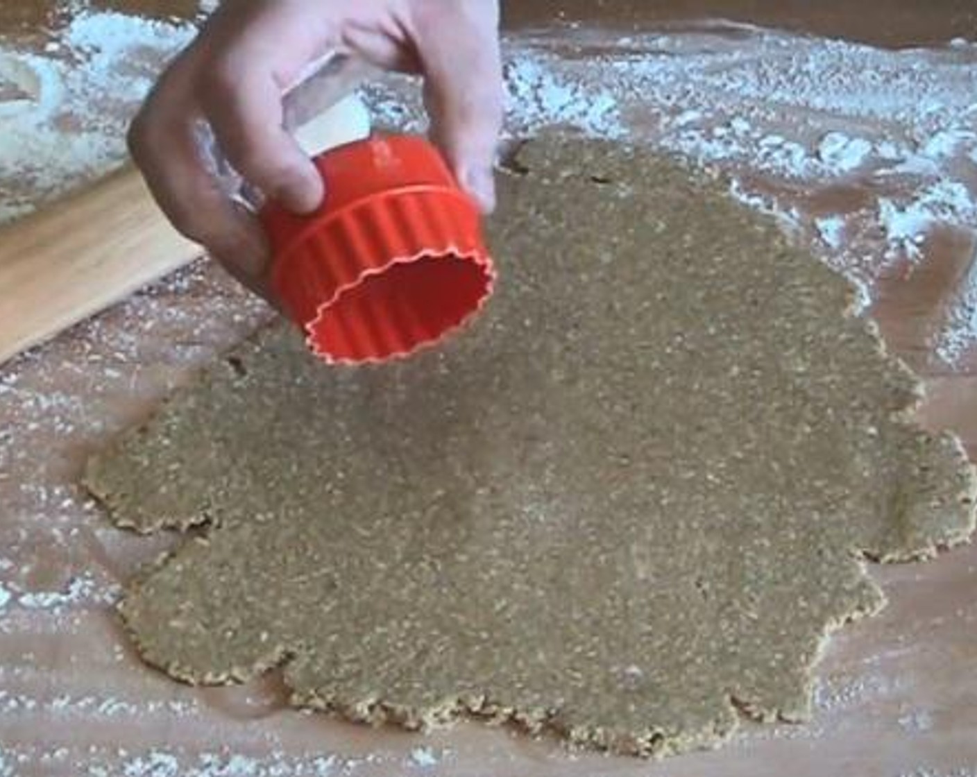 step 5 On a floured surface roll out each dough portion. Using a cookie cutter, cut out cookie shapes one at a time.