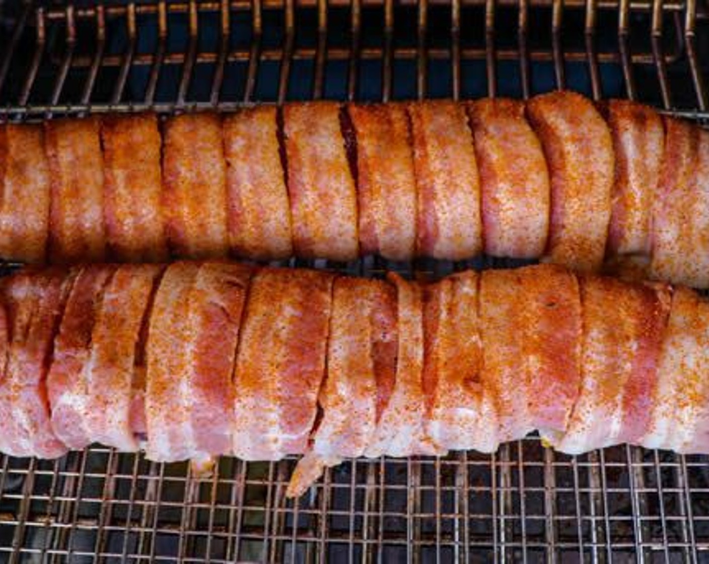 step 7 Place each backstrap on a wire cooling rack and set on the smoker.