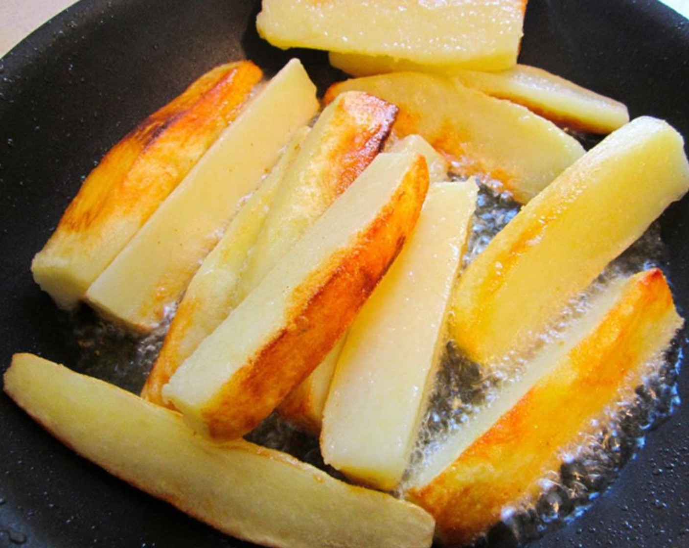 step 7 Drain the potatoes, then sauté them in Duck Fat (to taste) with Kosher Salt (to taste) and Cayenne Pepper (to taste).