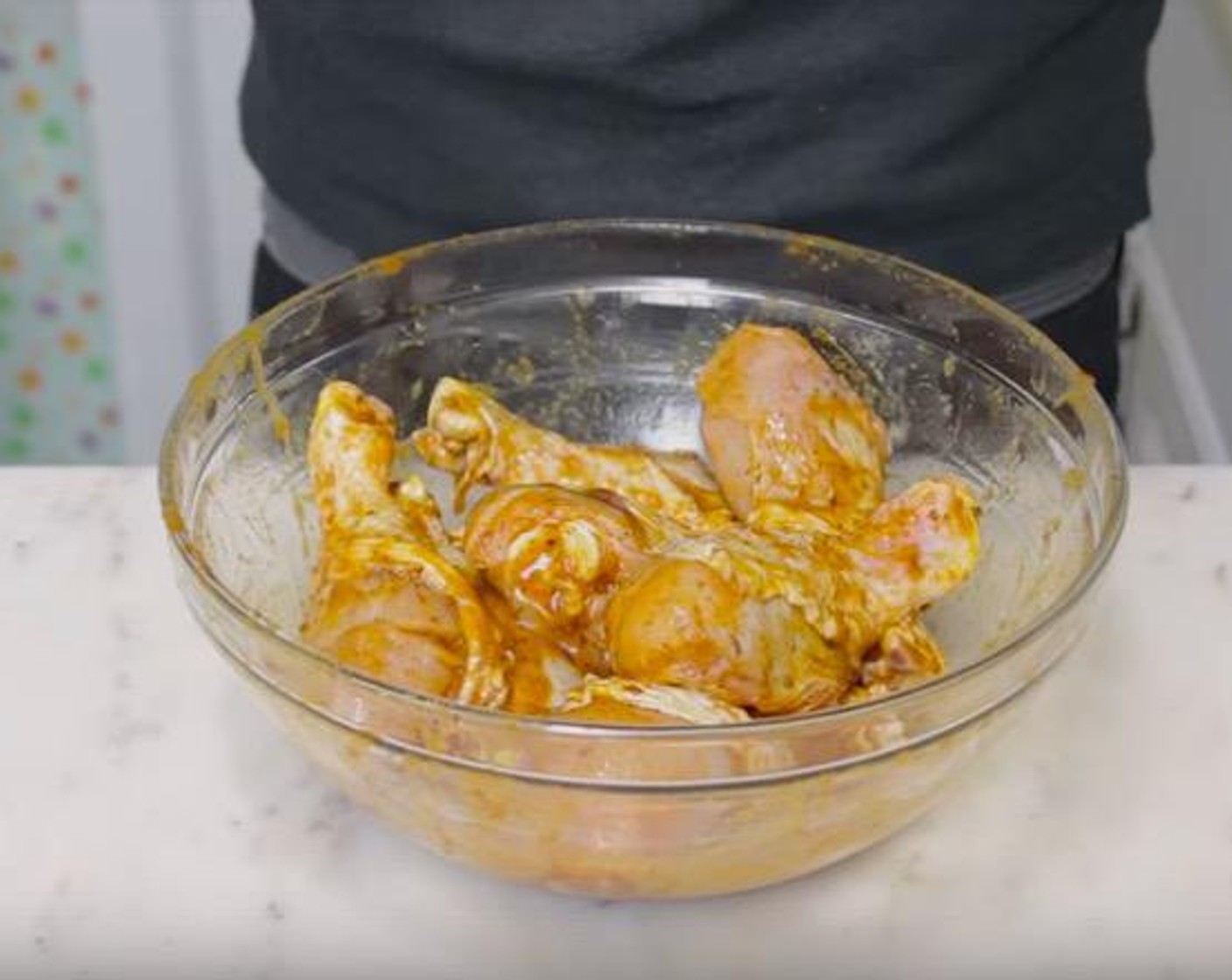 step 1 Add Chicken Drumsticks (2.5 lb) to a large bowl. Add Butter (1/4 cup), Cajun Seasoning (2 Tbsp), Onion Powder (1/2 Tbsp), McCormick® Garlic Powder (1/2 Tbsp), Salt (1/2 Tbsp), Ground Black Pepper (to taste), and juice of the Limes (2). Using hands or a large spoon, mix everything together until chicken is well coated.