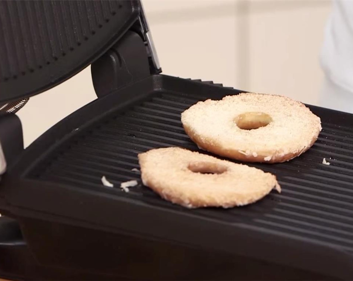 step 4 Place donuts in panini press, cut side up. Press for about 30 seconds. Set aside in a plate. They crisp up as they cool off.