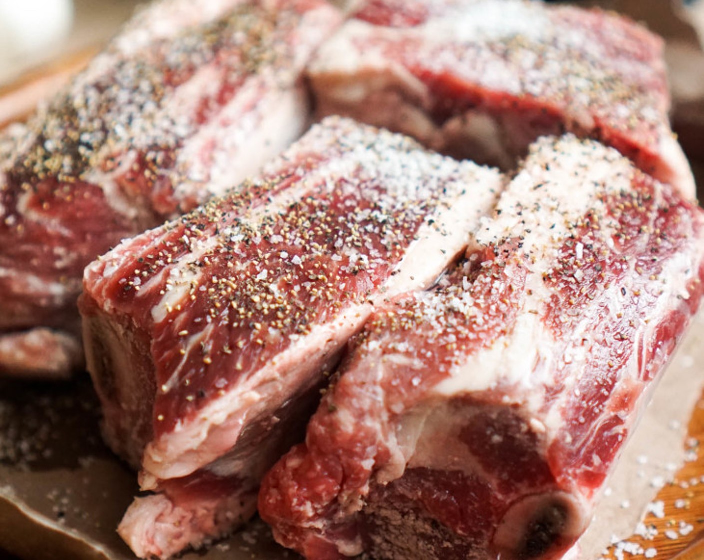 step 2 Season the Beef Short Ribs (7) heavily on all sides with Kosher Salt (to taste) and Ground Black Pepper (to taste).