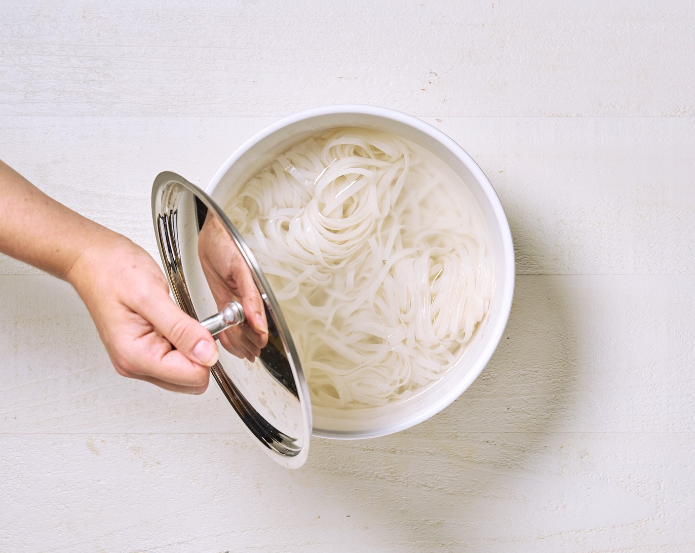 step 1 Bring a large pot of water to a boil. Place the Rice Noodles (1 pckg) in a large heat-safe bowl. Carefully pour the boiling water overtop. Cover and let it sit for 5-10 minutes.
