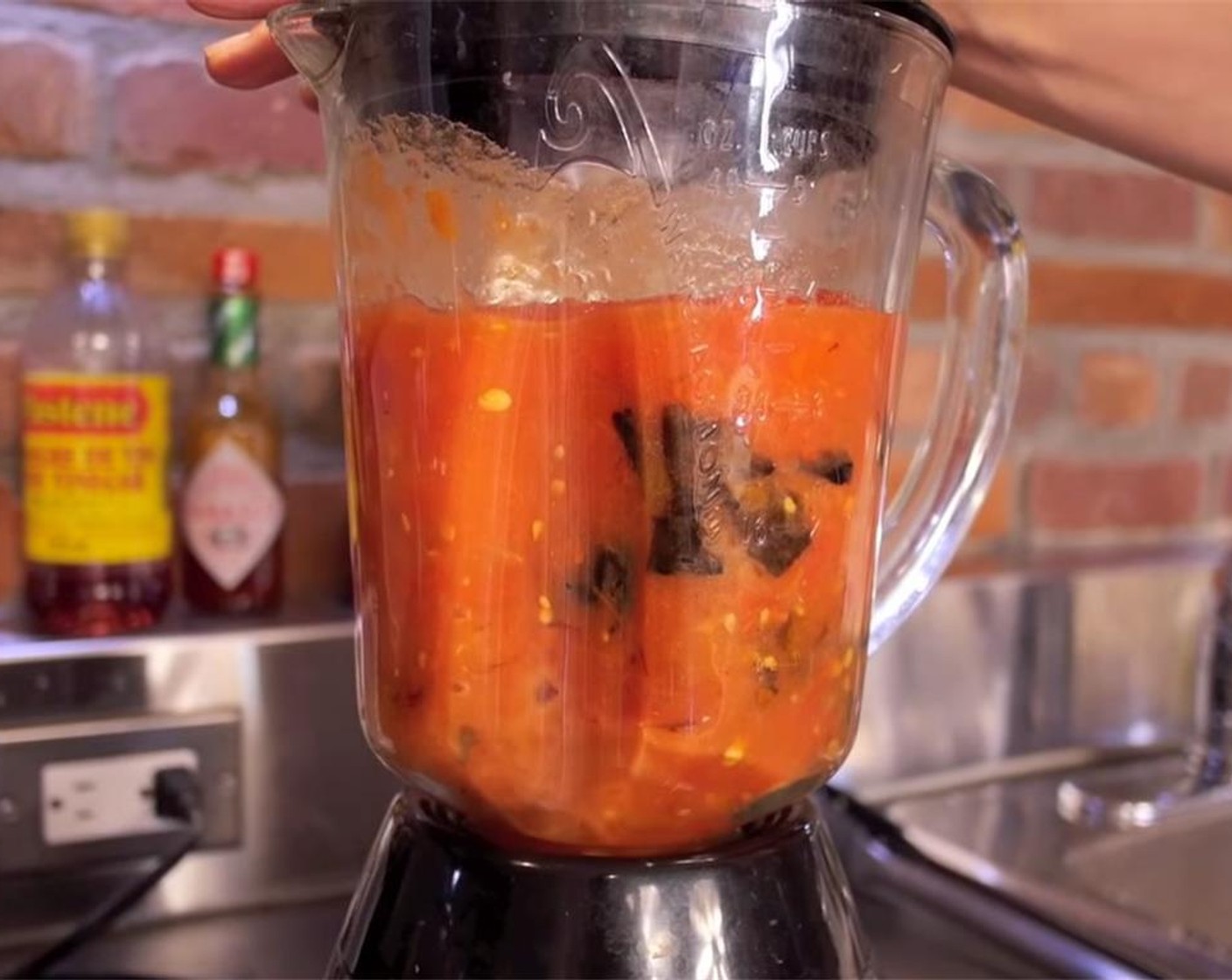 step 3 In a blender, thoroughly blend chilis with Tomatoes (2 1/4 cups) until no chunks remain.