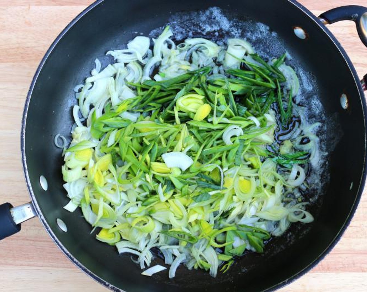 step 2 Add in the Leek (1)  cut into julienne, and saute until soft