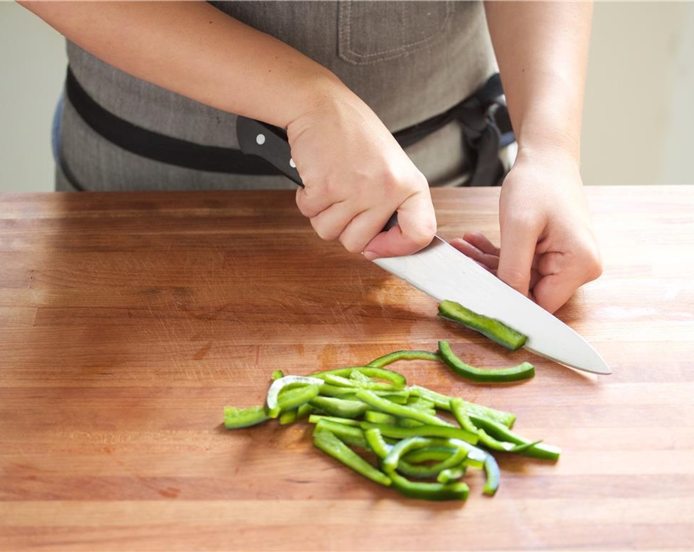 step 2 Remove the stem, pith, and seeds from both the Bell Pepper (1) and Chilaca Pepper (1). Slice thinly.