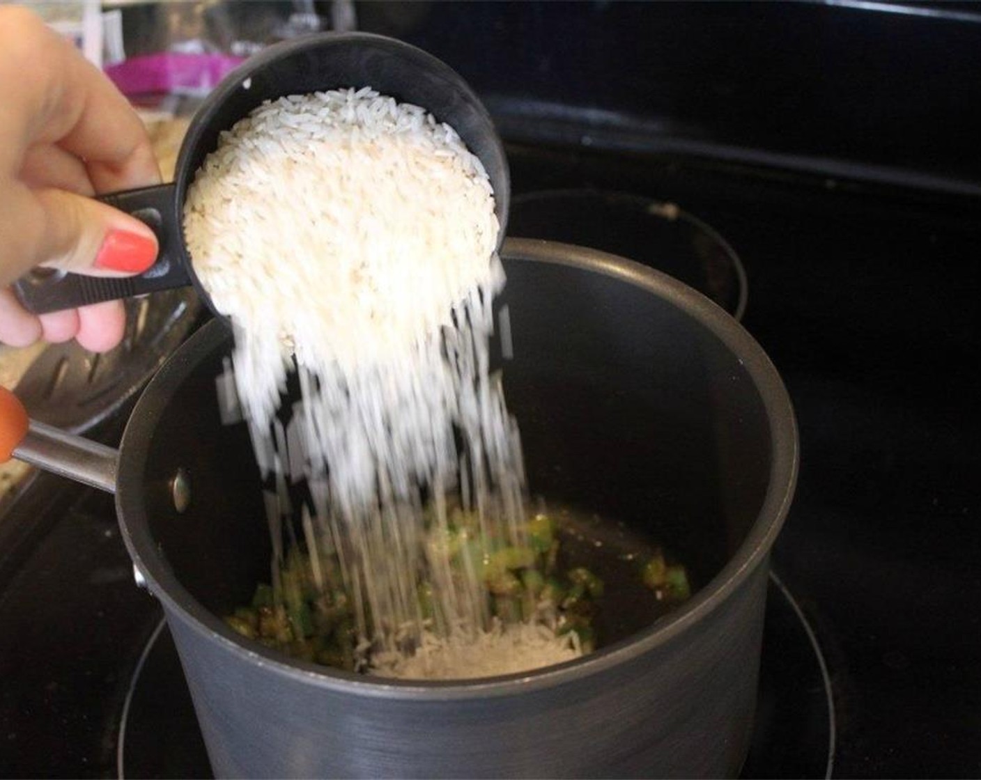 step 5 Stir the green pepper for 5 minutes or so until it starts to soften, then add the White Rice (1 cup). 1 cup makes plenty for 4 people!