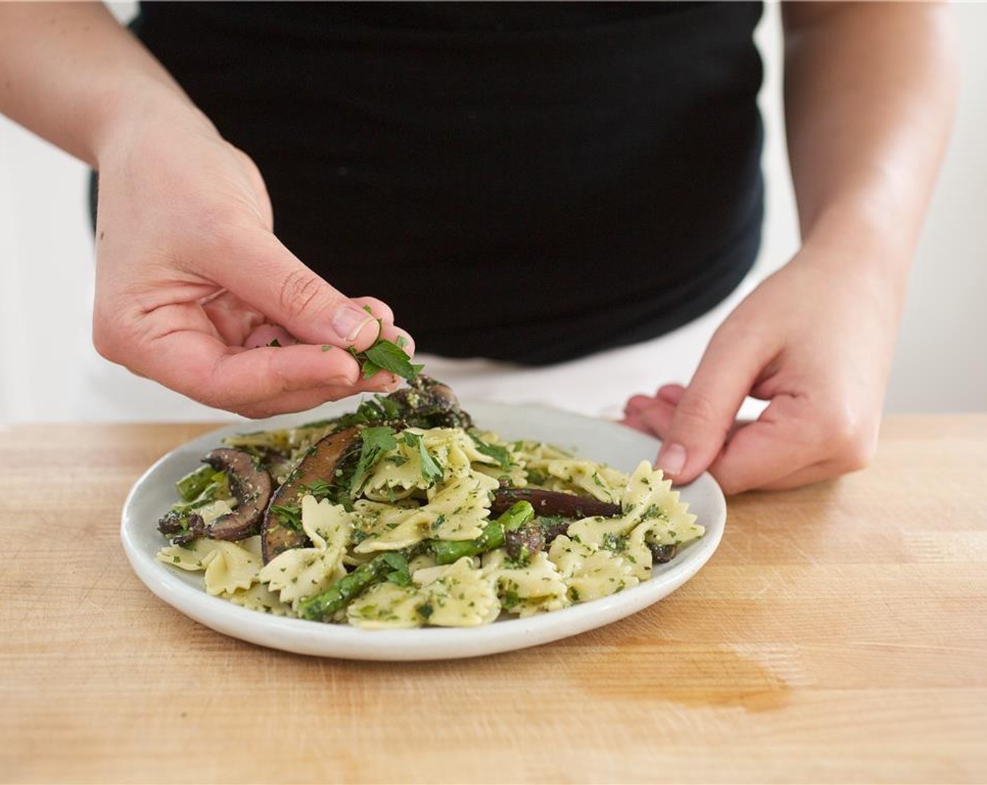 step 11 Serve on large plates, garnished with some additional pesto if desired.