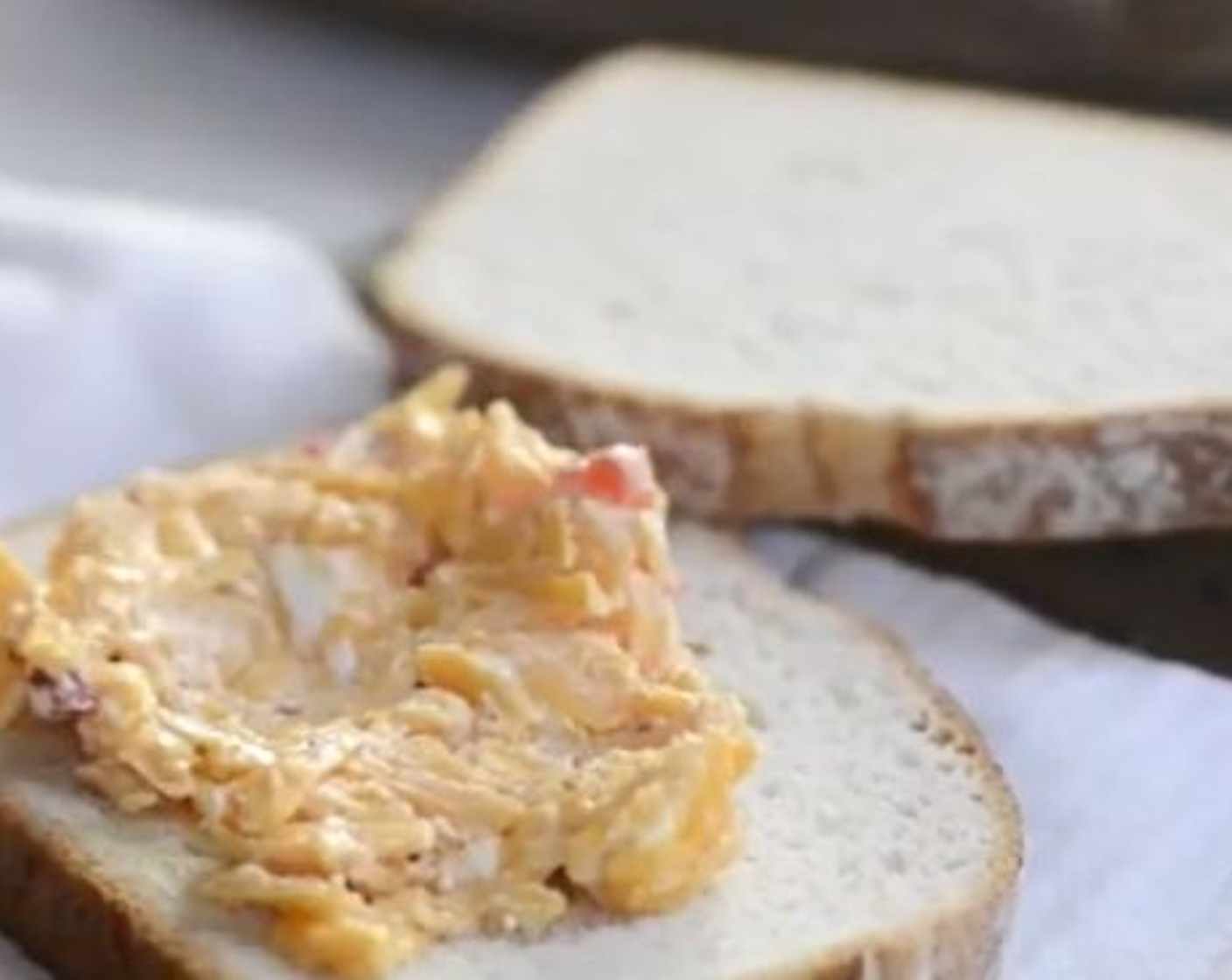 step 1 Start with a nice slice of Bread (1 slice), and spread the Pimento Cheese (1 Tbsp) on top.