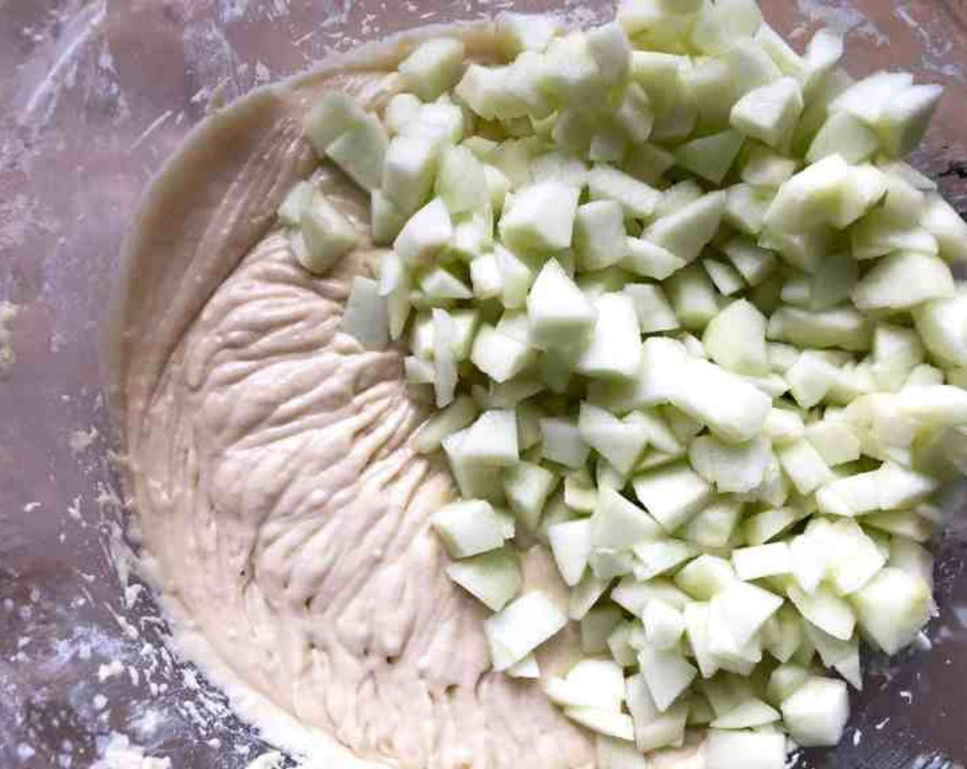step 7 Add to the almond batter and beat until well blended. Then fold in the diced apples.