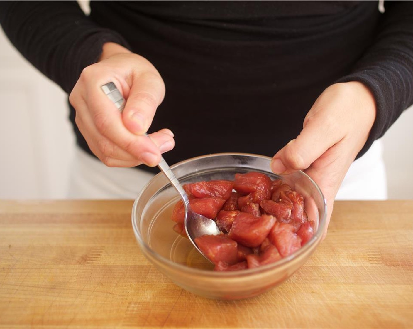 step 7 Pat dry the Pork Tenderloin (8 oz) with paper towels and cut it into three quarter-inch cubes. Place in a medium bowl. Add half of the Low-Sodium Tamari Sauce (1 Tbsp) and stir until coated.