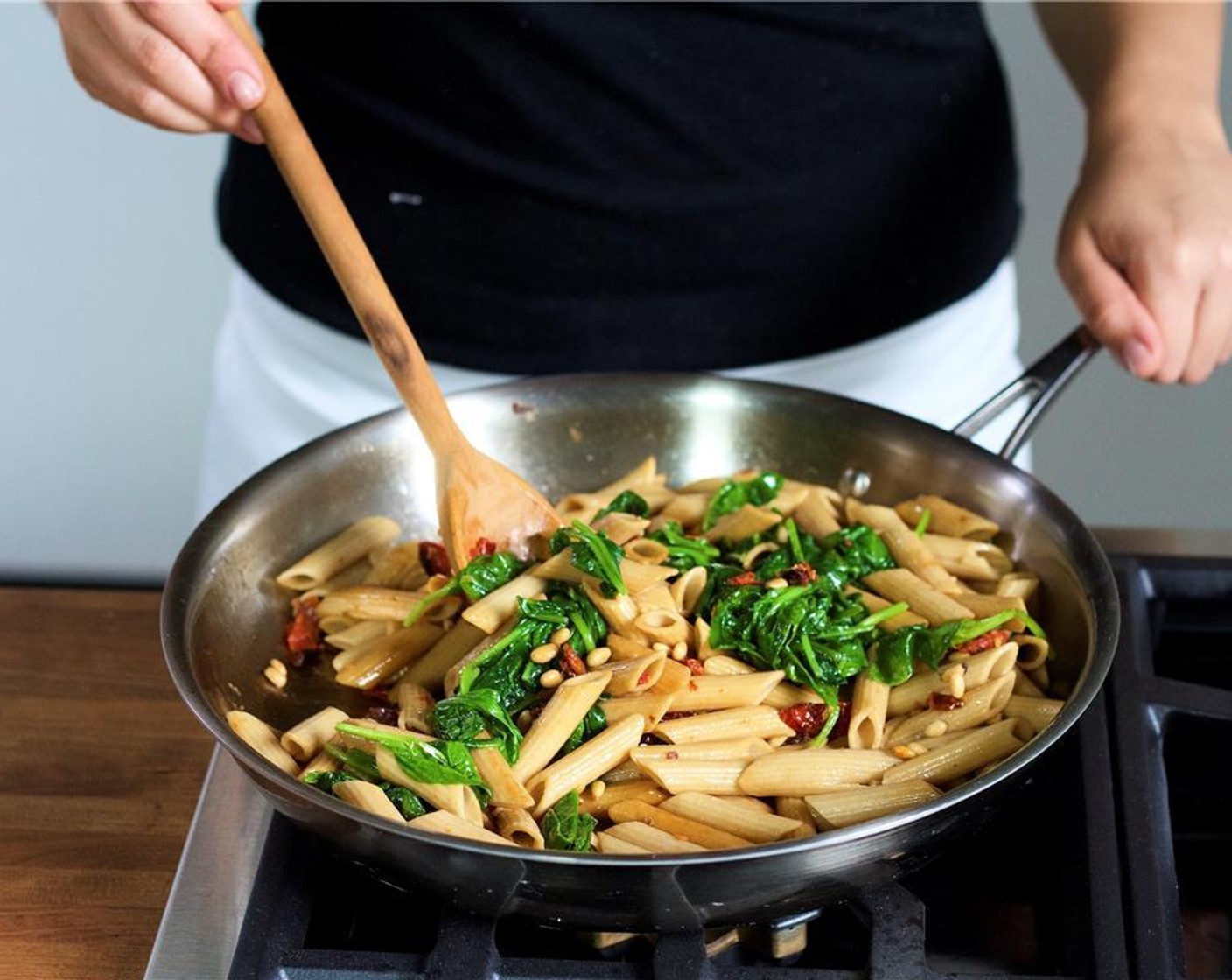 step 11 Meanwhile, add Pine Nuts (2 Tbsp) and the Fresh Baby Spinach (3 3/4 cups) and remaining basil to the pasta mixture and toss to combine. Cook for 2 minutes to allow the spinach to wilt slightly.