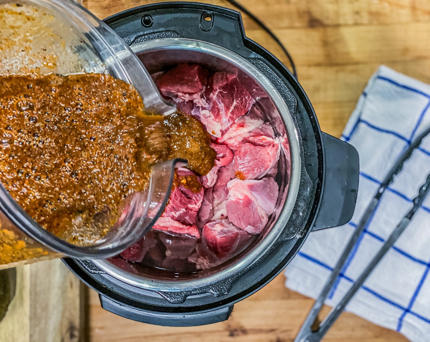 step 4 Add Boneless Chuck Roast (2 lb), Water (2 cups), and marinade to the instant pot. Cover, and cook on pressure cook high for 90 minutes.