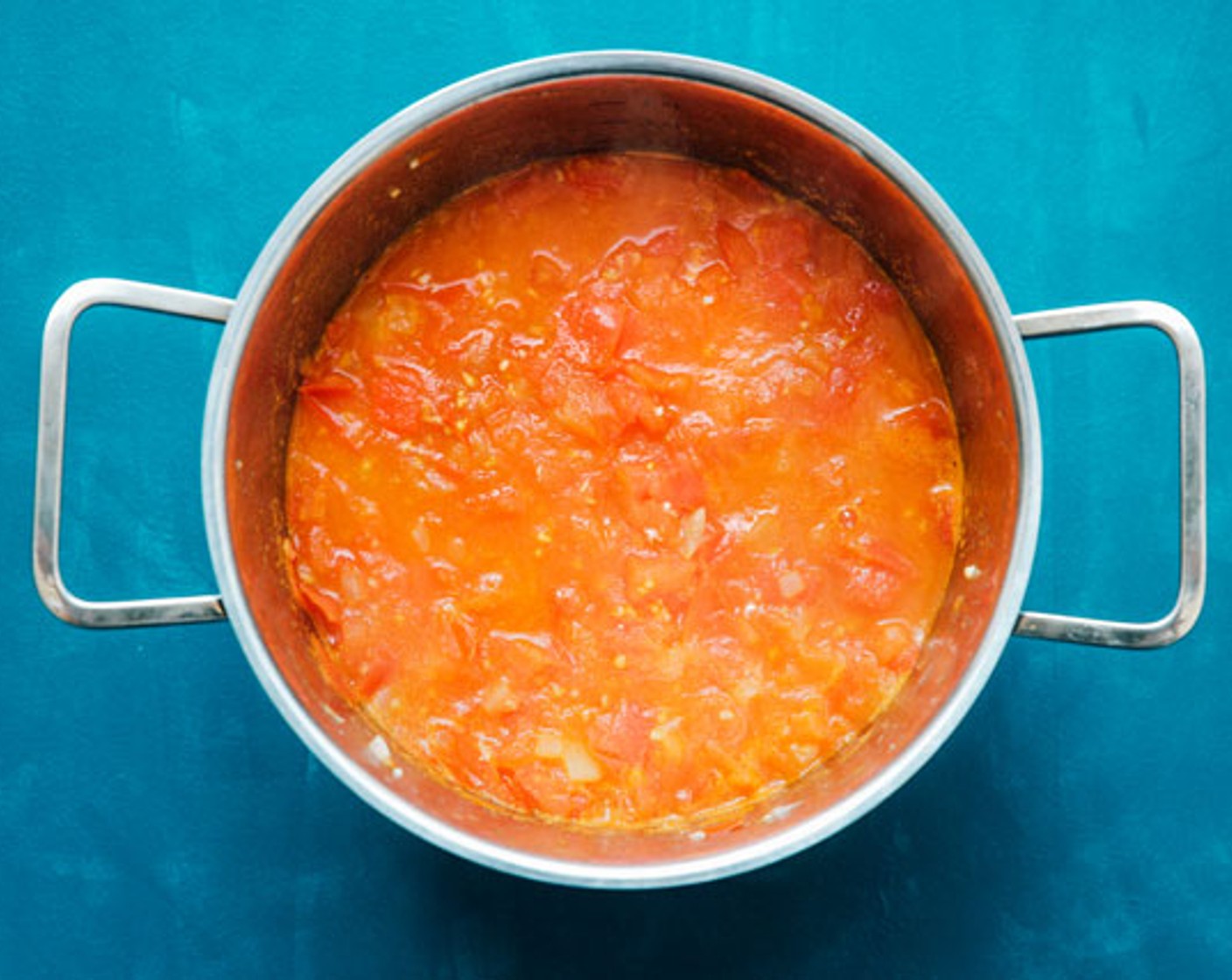 step 2 Stir in Tomatoes (7 cups) and continue cooking, uncovered, until tomatoes have mostly broken down, about 10 minutes.