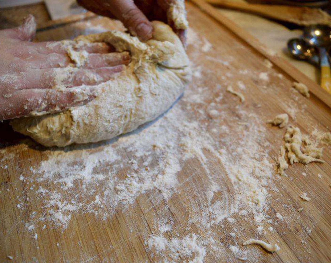 step 4 Dust a clean work surface with flour. Turn the dough out of the bowl and put on the floured work surface. Knead the dough for 5 minutes until a smooth ball is formed. If you are working your dough and you find it sticky keep adding flour to the work surface.