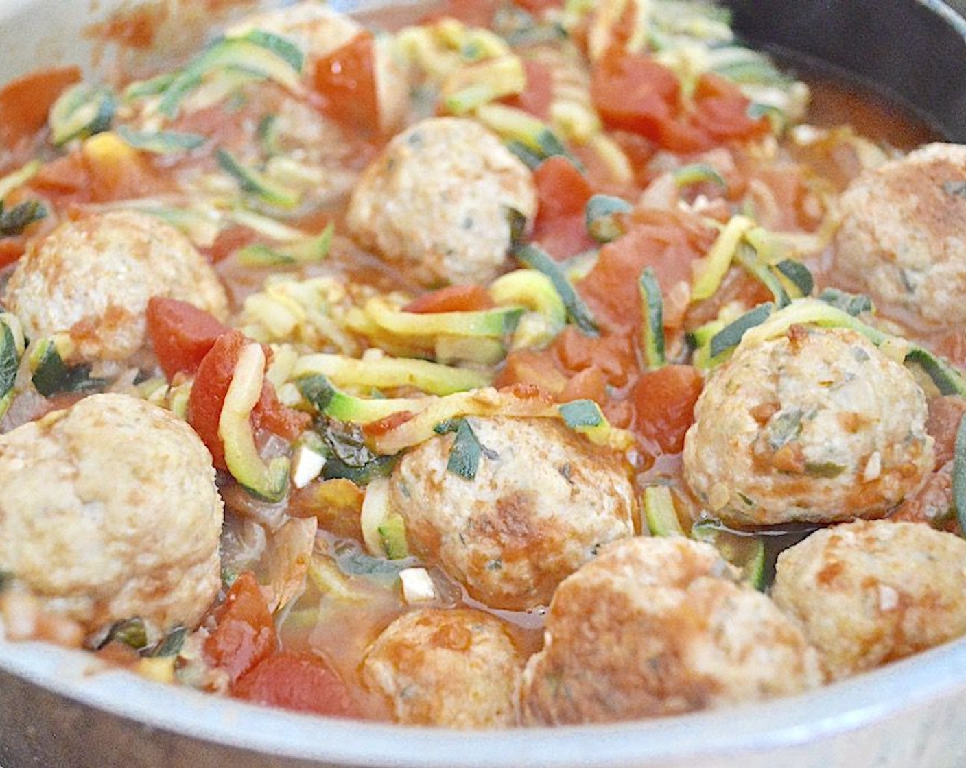 step 9 Drain them and stir them into the sauce and meatballs for a minute.