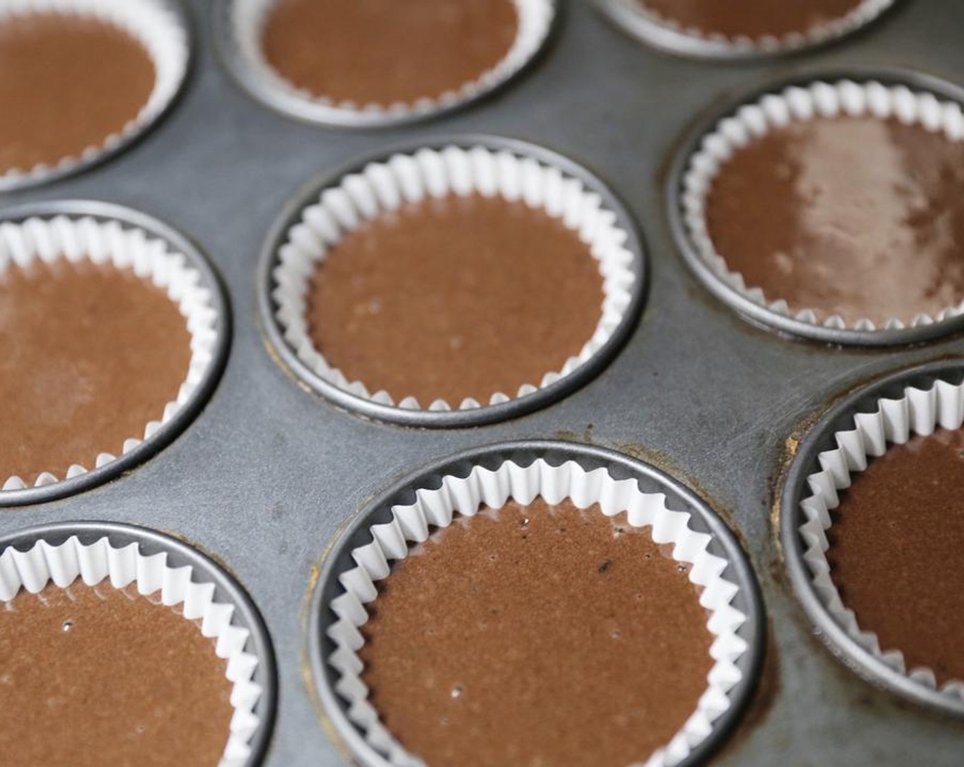 step 6 Spoon the mixture into your cupcakes liners and place in the oven. Bake for around 30 to 40 minutes.