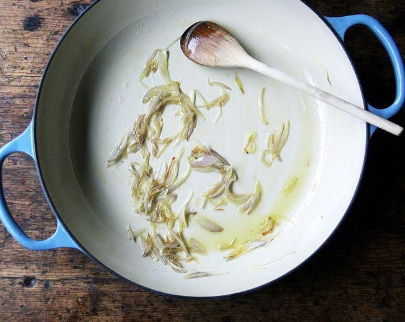 step 2 In a large oven-safe skillet over high heat, heat the Olive Oil (1 Tbsp) until it shimmers. Add the Shallot (1) and immediately reduce the heat to medium. Add a pinch of Kosher Salt (1 dash), and sauté until the shallots are soft and translucent, about 5 minutes.