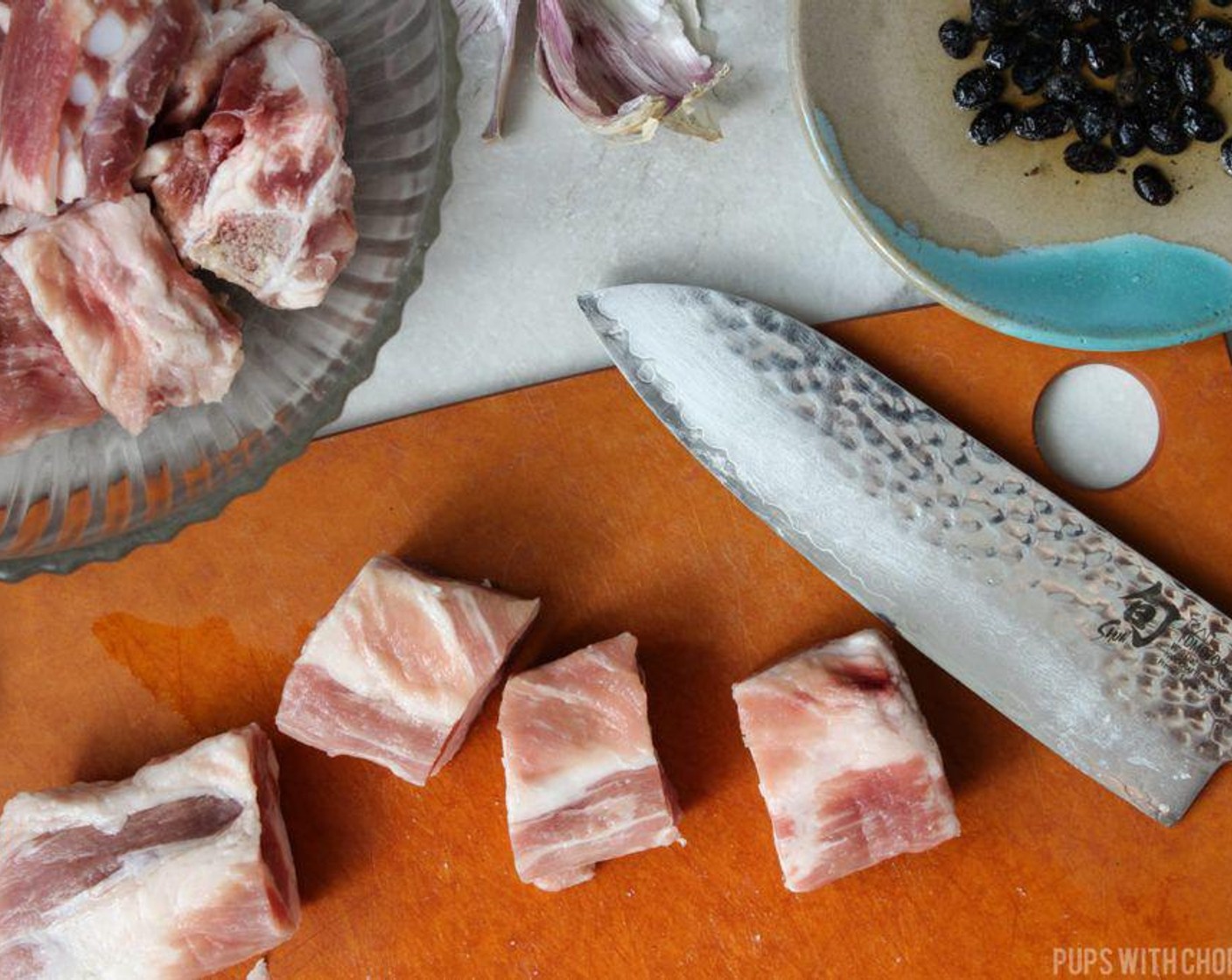 step 1 Cut the Spare Ribs (1.5 lb) into 1-inch bite-sized pieces and place it in a bowl.