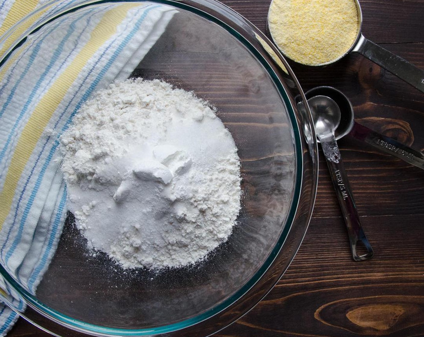 step 1 In a large bowl, whisk together the All-Purpose Flour (1 1/2 cups), Cornmeal (1/2 cup), Granulated Sugar (1 Tbsp), Baking Powder (1/2 Tbsp), and Salt (3/4 tsp).