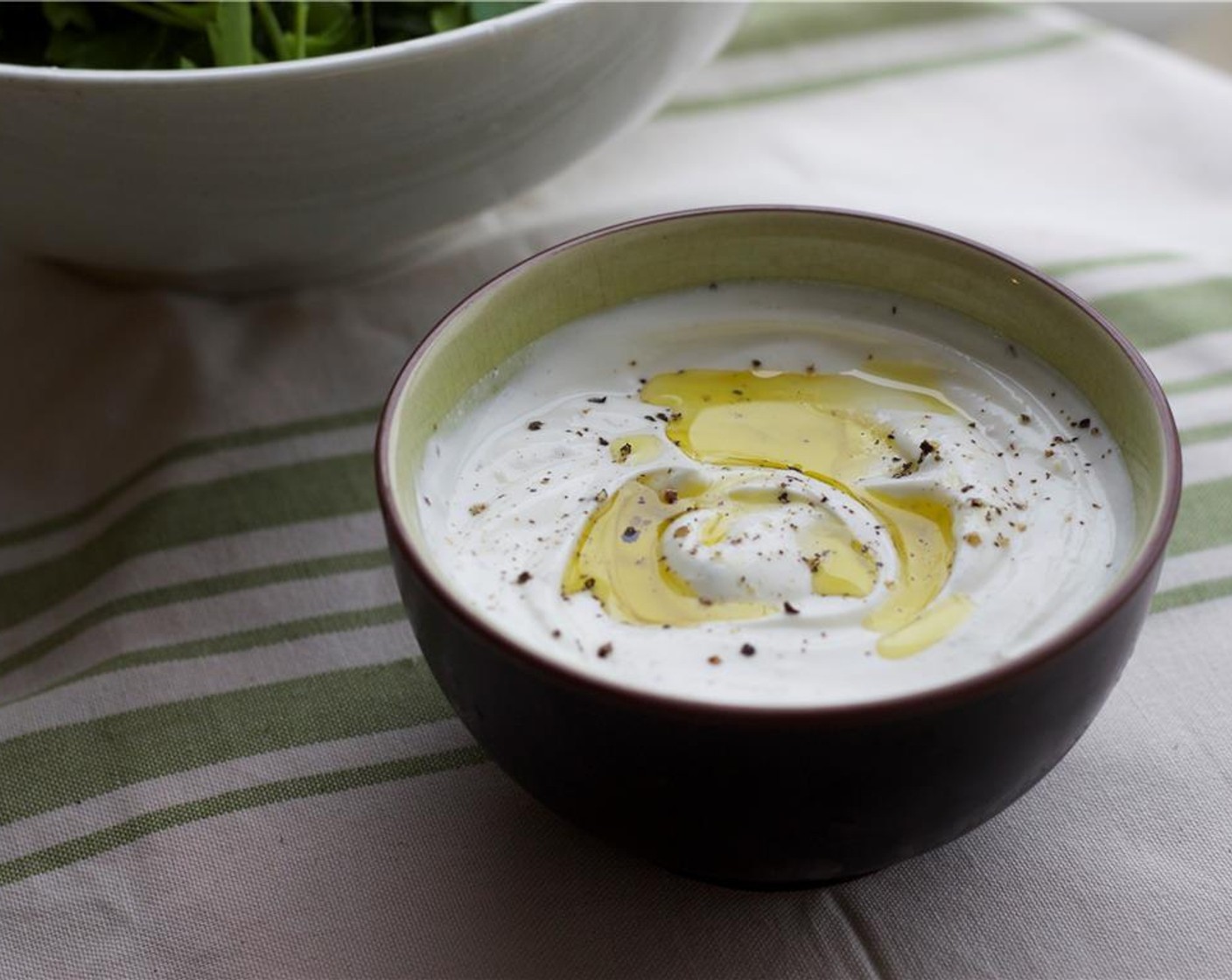 step 5 In a separate bowl, whisk together the Greek Yogurt (1 cup), Salt (1/4 tsp), Ground Black Pepper (1/4 tsp) and 1 Tbsp of juice from Lemon (1).