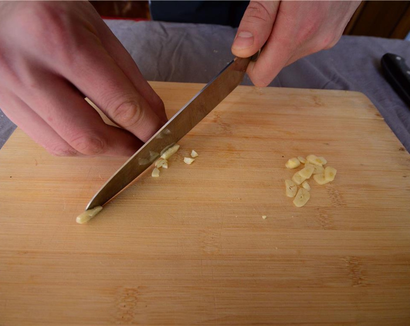 step 2 Thinly slice the Garlic (2 cloves).