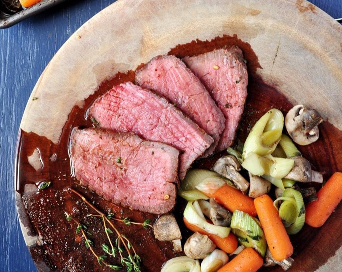 step 7 Remove from the oven, loosely cover the roast with foil and let it stand for 5 minutes. Slice and serve with vegetables. Enjoy!