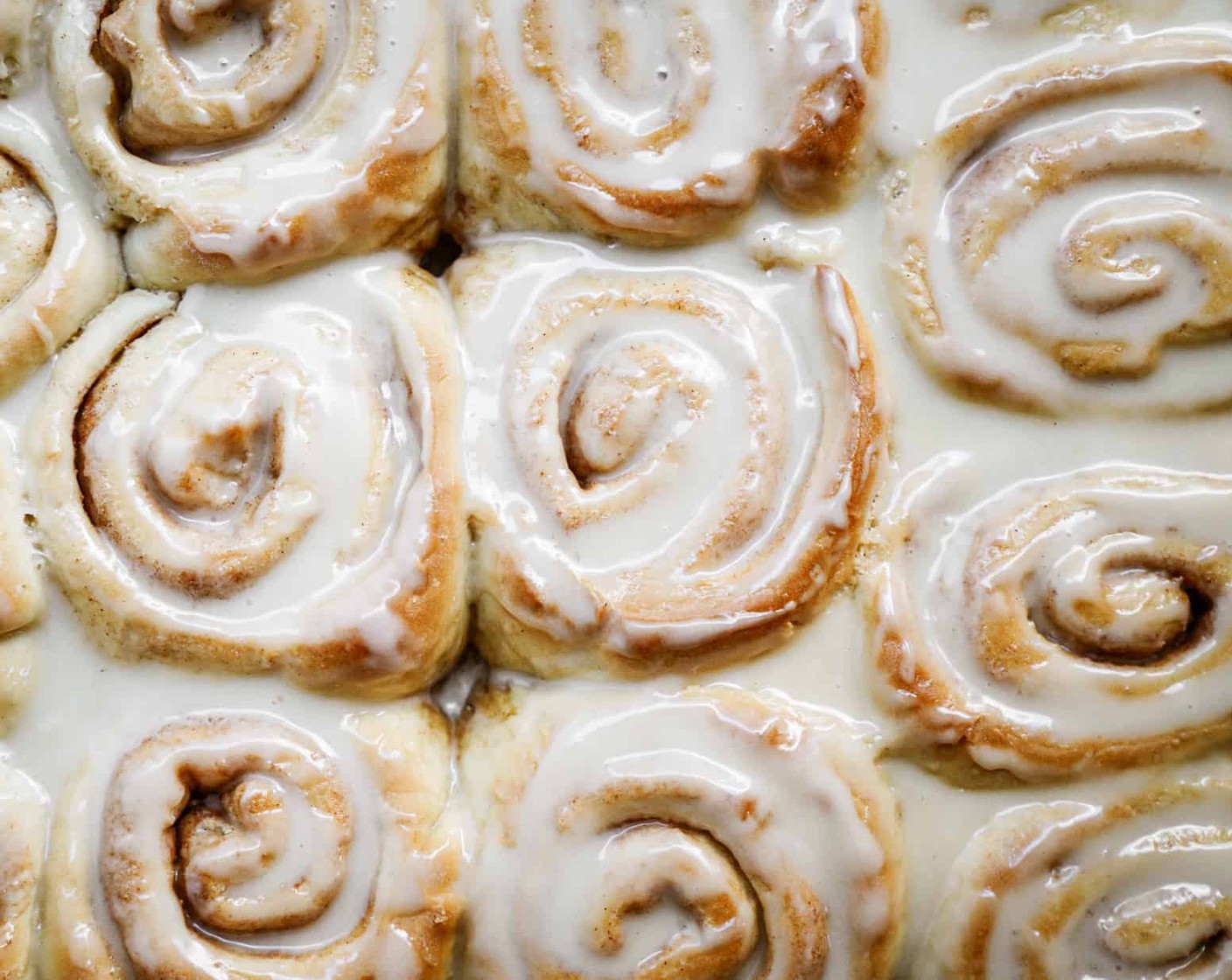 step 15 Once your cinnamon buns are ready then spread over the icing and enjoy these babies hot! They last for one week in a tightly sealed container, keep at room temperature.