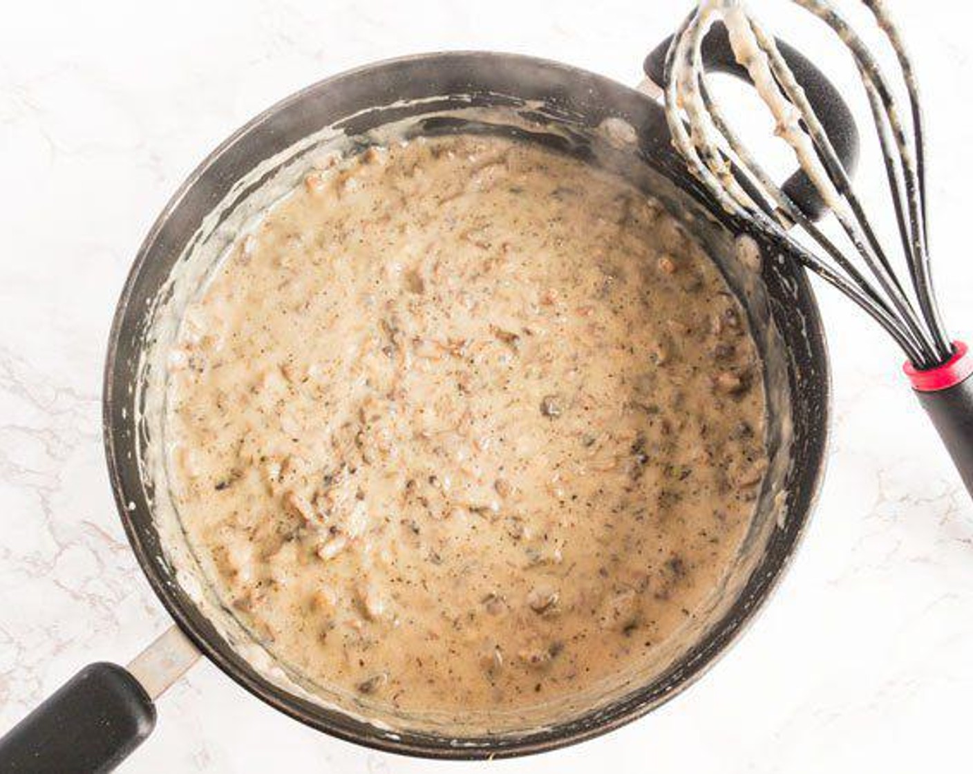 step 2 In saucepan, combine Almond Milk (4 cups) Unbleached All-Purpose Flour (1/3 cup), Buttery Spread (4 Tbsp), Brown Mushrooms (1 pckg), Salt (to taste), and Ground Black Pepper (to taste). Stir until thick, about 5 minutes.