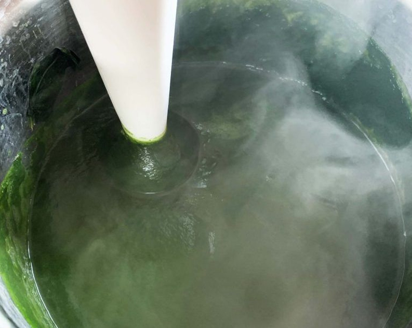 step 3 Puree with an immersion blender, until spinach turns creamy and smooth.