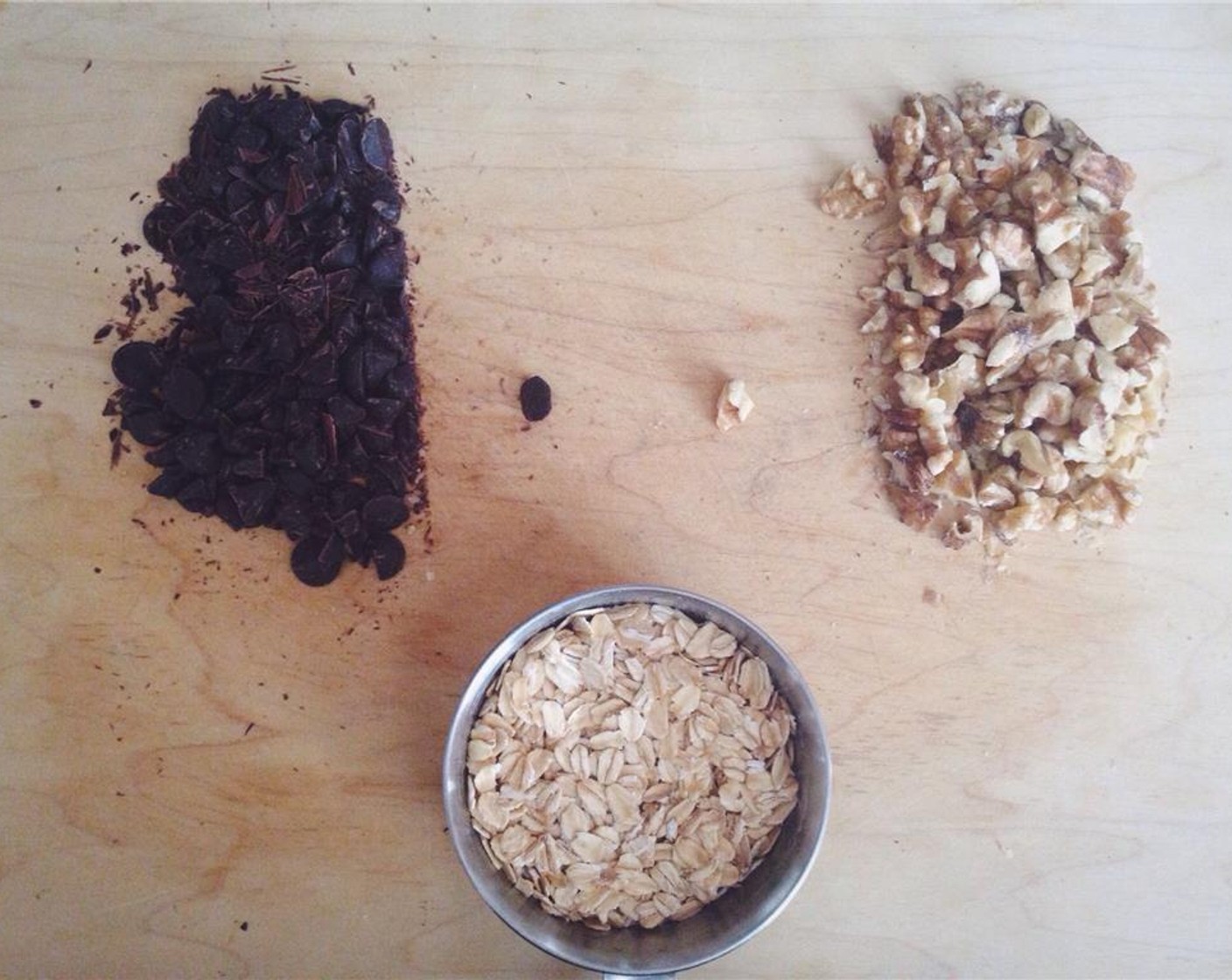 step 5 Combine Old Fashioned Rolled Oats (3/4 cup) into the large mixing bowl. Make sure to chop the Dark Chocolate Chips (1/4 cup) and chop the Walnut (1/2 cup) into 1/4-inch pieces.