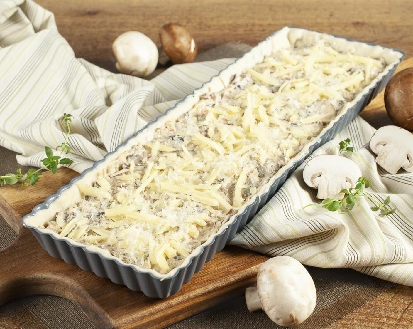 step 8 Spread filling evenly into pastry shell and sprinkle with remaining Gruyère Cheese (4 Tbsp). Bake for about 25 minutes until golden and filling is bubbly.