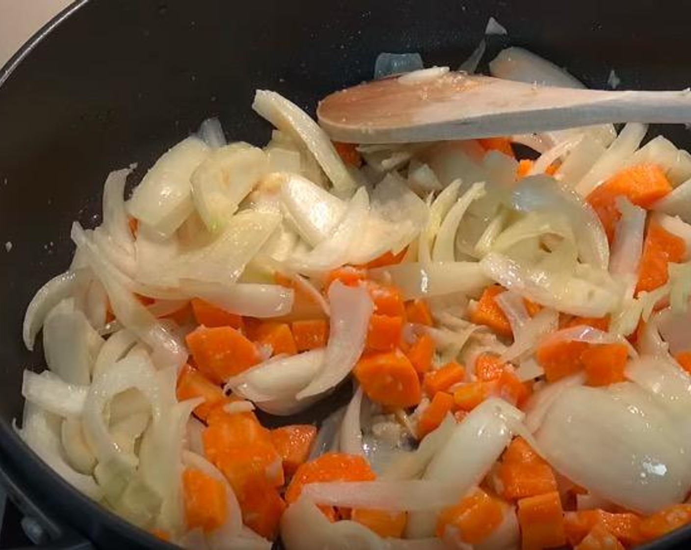 step 2 In the same pan over medium heat, add Garlic (2 cloves), Yellow Onions (2) and Carrots (2). Cook, stirring, for a couple minutes or until the vegetables have started to soften.