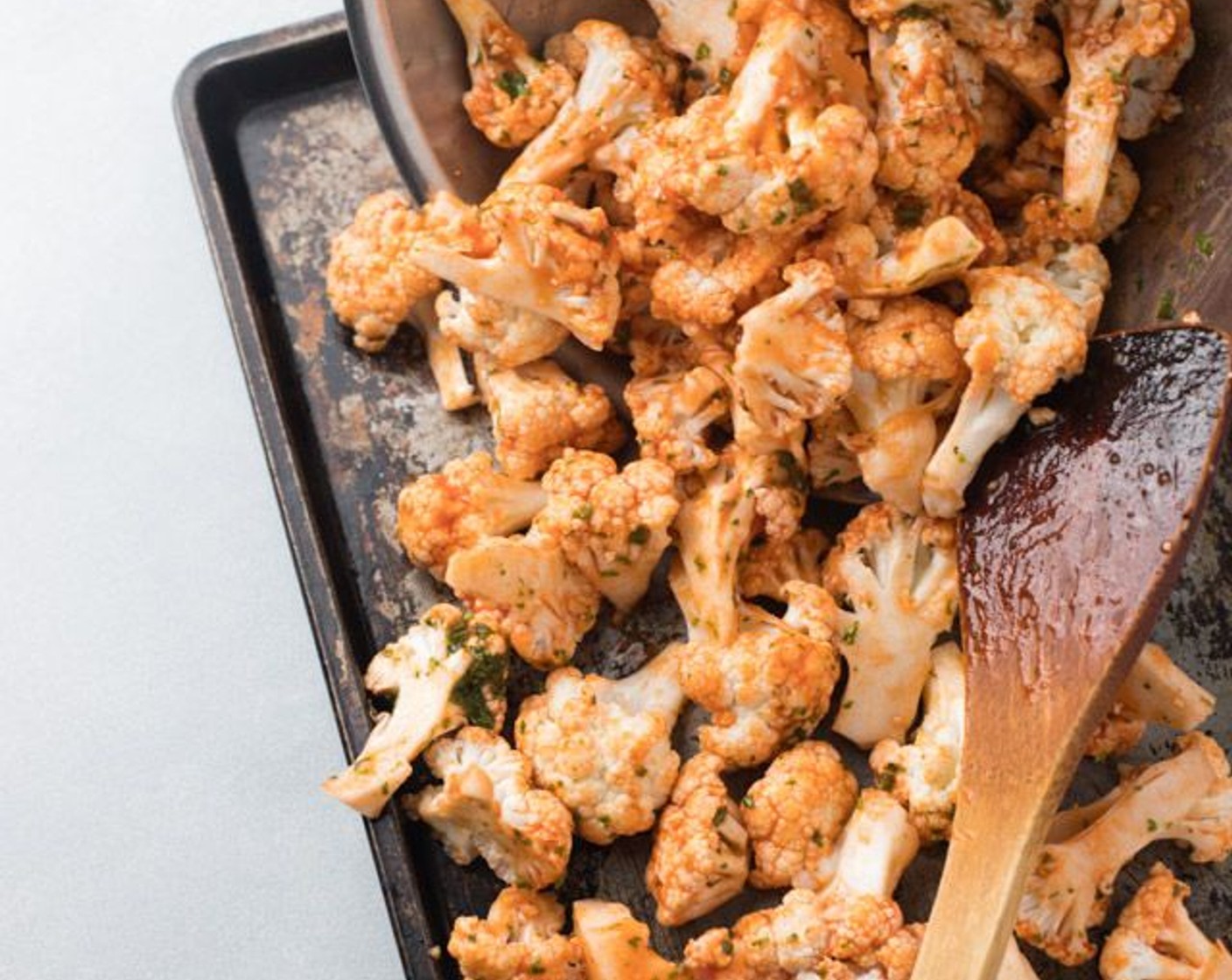 step 4 Bake on a sheet pan at 425 degrees F (220 degrees C) for 20 minutes. Stir cauliflower half way through.