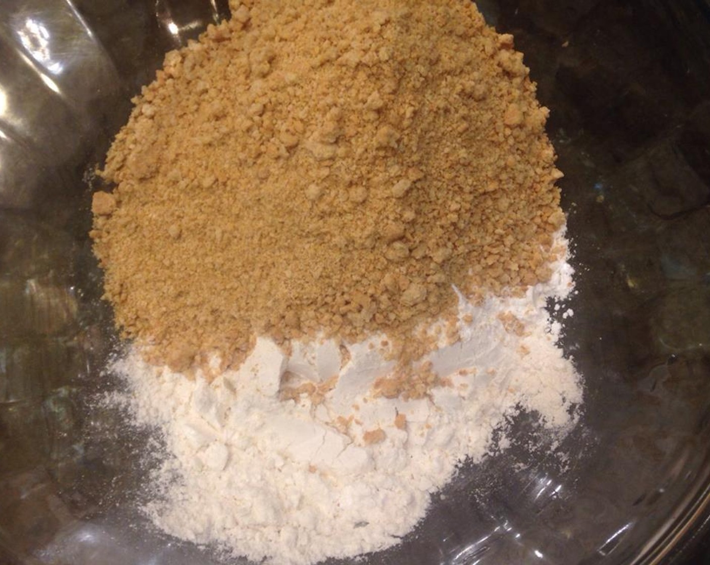 step 2 Combine graham crackers, 3/4 cups of All-Purpose Flour (1 cup) and an additional 4 tablespoons of flour and Baking Powder (1/2 Tbsp) in a mixing bowl.