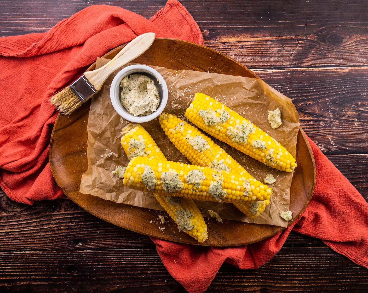 step 5 Serve the hot corn slathered in the garlic parmesan herb butter.