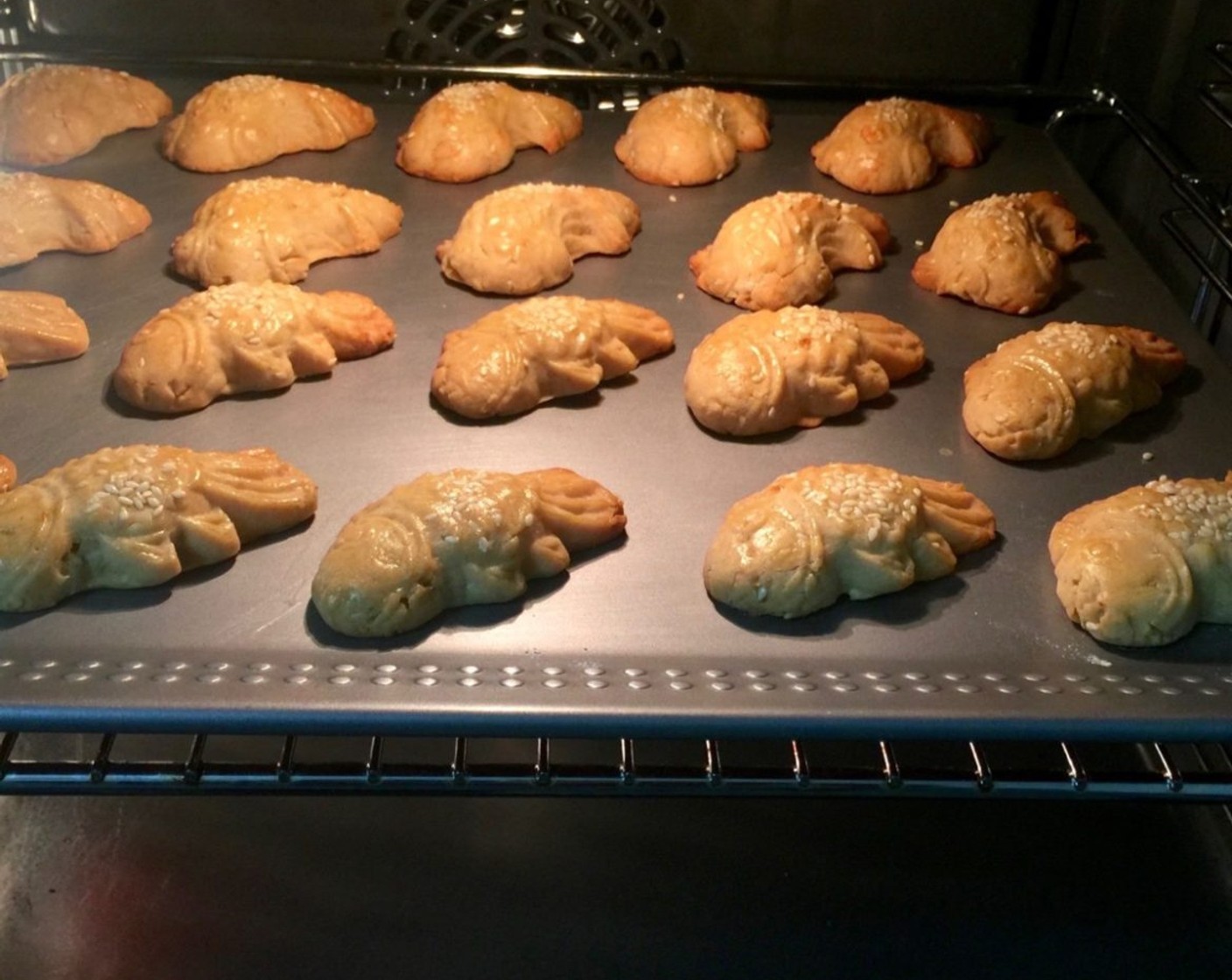 step 18 Preheat oven to 190 degrees C (375 degrees F) and place wire rack in centre of oven. Bake the mooncakes for 10 minutes.