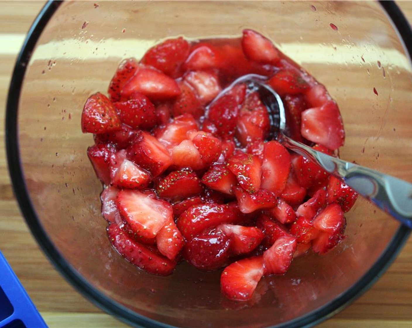 step 2 Sprinkle with Granulated Sugar (2 Tbsp) and stir gently with a spoon. Set aside in the fridge for 5-10 minutes to allow berries to release their juices.