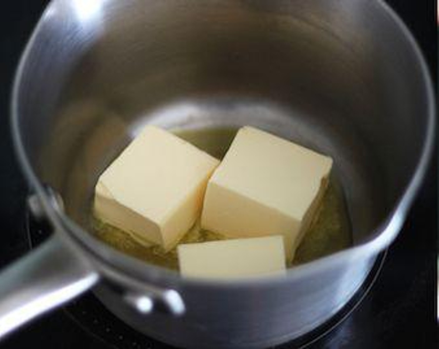 step 3 Set your pan over the lowest heat and melt the Unsalted Butter (1/3 cup).