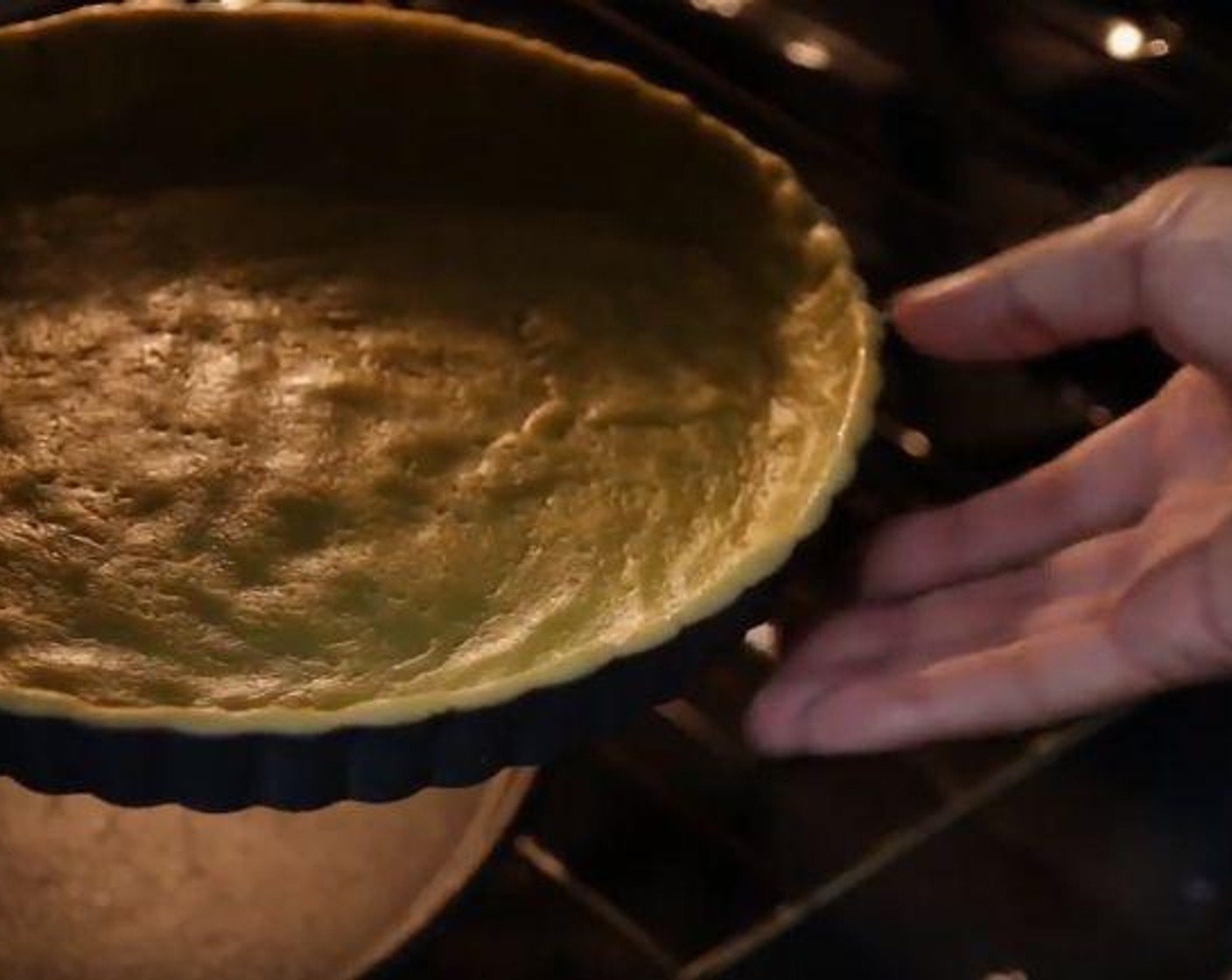 step 4 Prick the bottom of dough with a fork do it doesn't puffs up while it bakes. Bake for 5 minutes at 400 degrees F (200 degrees C).