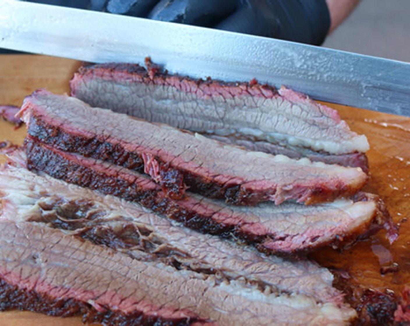 step 10 Separate the flat and point. Slice flat across the grain into 1/4-inch slices. Shred the point end of the brisket by hand. Reserve the Brisket Jus for added moisture if desired.