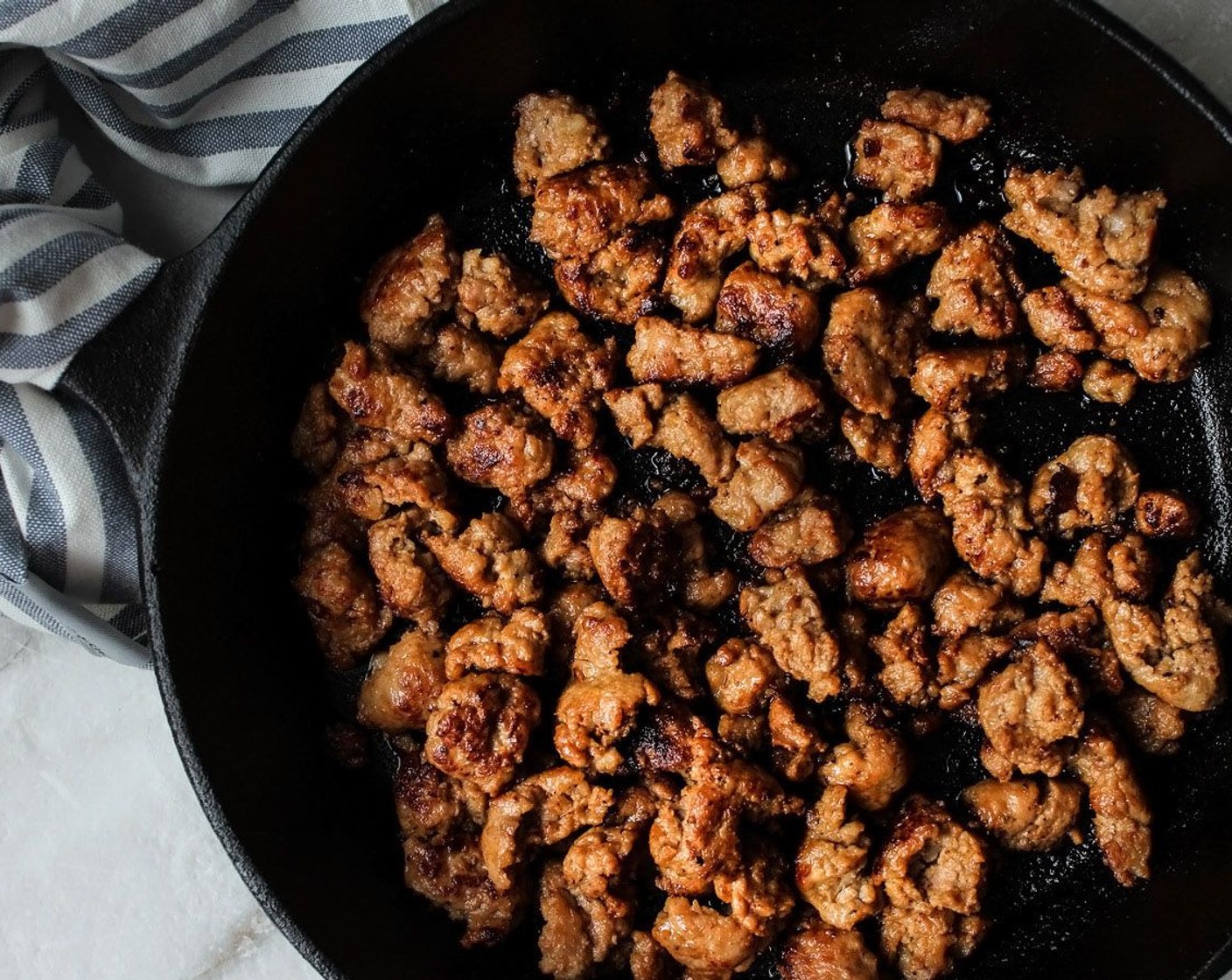 step 16 Once the sausage is done, remove it from the pan and set aside. Leave the drippings in the pan.