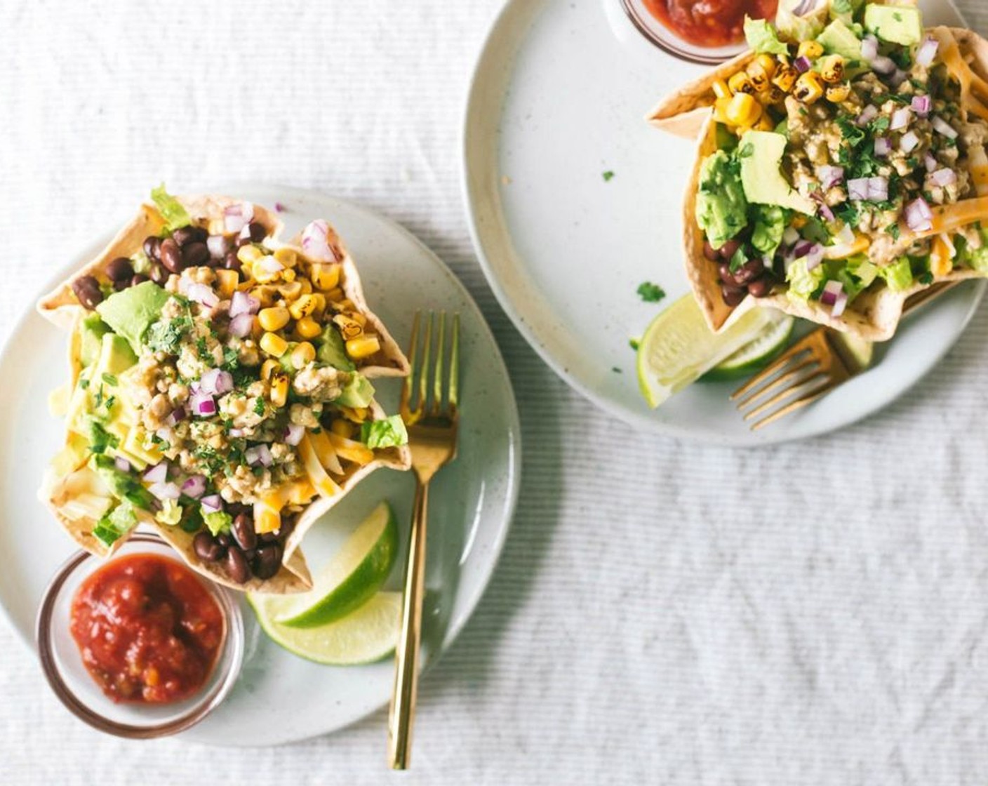 step 5 Top with Salsa Verde chicken, Corn (1 cup), Black Beans (1 cup), Monterey Jack Cheese (1 cup), Avocado (1), Red Onion (1/4 cup) Fresh Cilantro (1/4 cup), and Medium Salsa (1/3 cup). Serve immediately.
