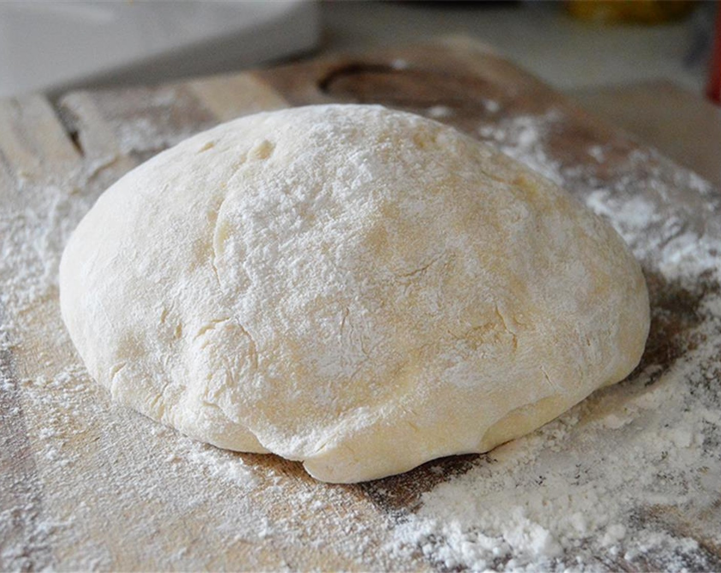 step 4 Turn dough out onto floured surface. Knead for 3-4 minutes or until dough is smooth and elastic.