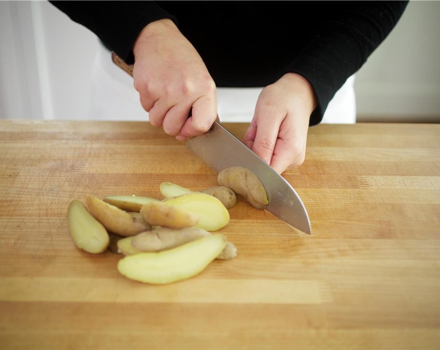 step 3 Allow potatoes to cool, and slice into quarter inch slices.