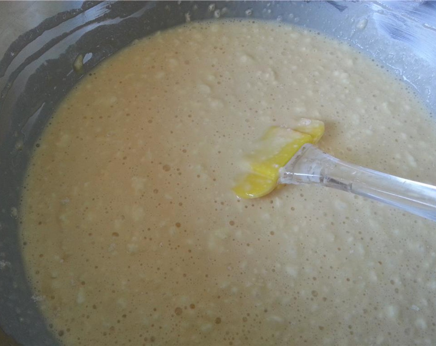 step 4 Slowly whisk the flour mixture into the wet mixture so that no clumps form. Whisk through to a fluffy consistency and refrigerate for ten minutes.