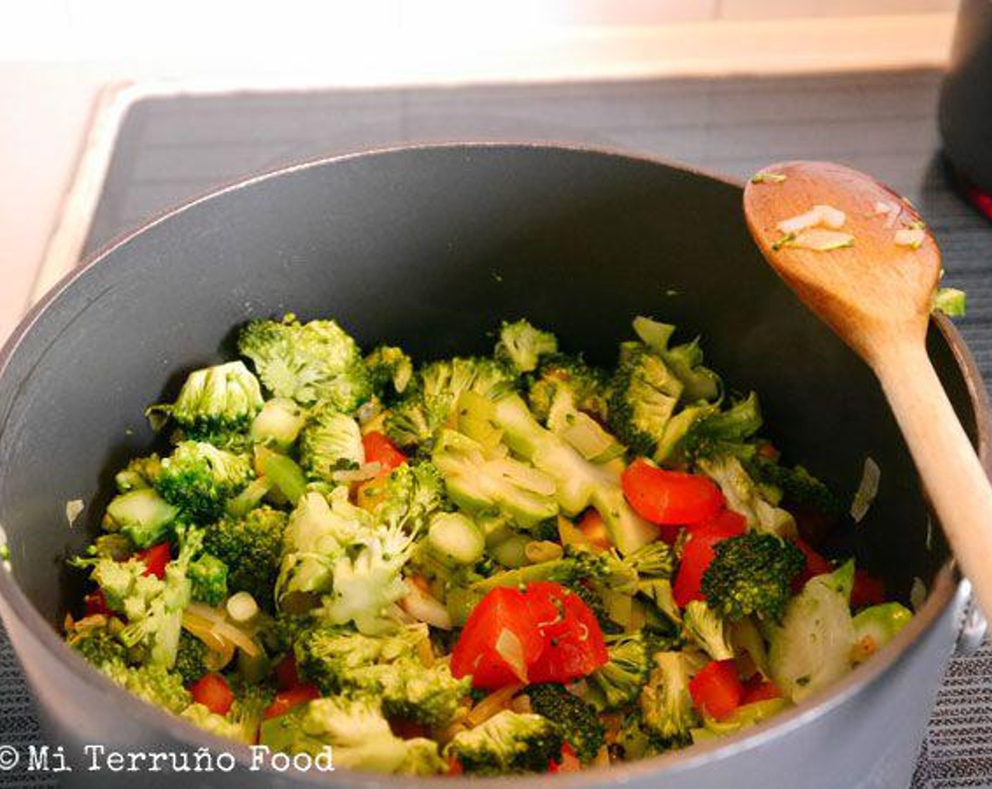 step 6 Add the broccoli florets, tomato, and add between 1 1/2 to 2 cups of water. You can take pasta water or fresh water and add cheese.