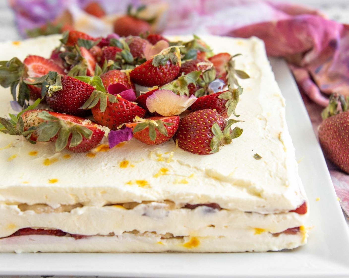 step 10 Remove the cake from the pan and decorate with strawberries. Enjoy immediately.