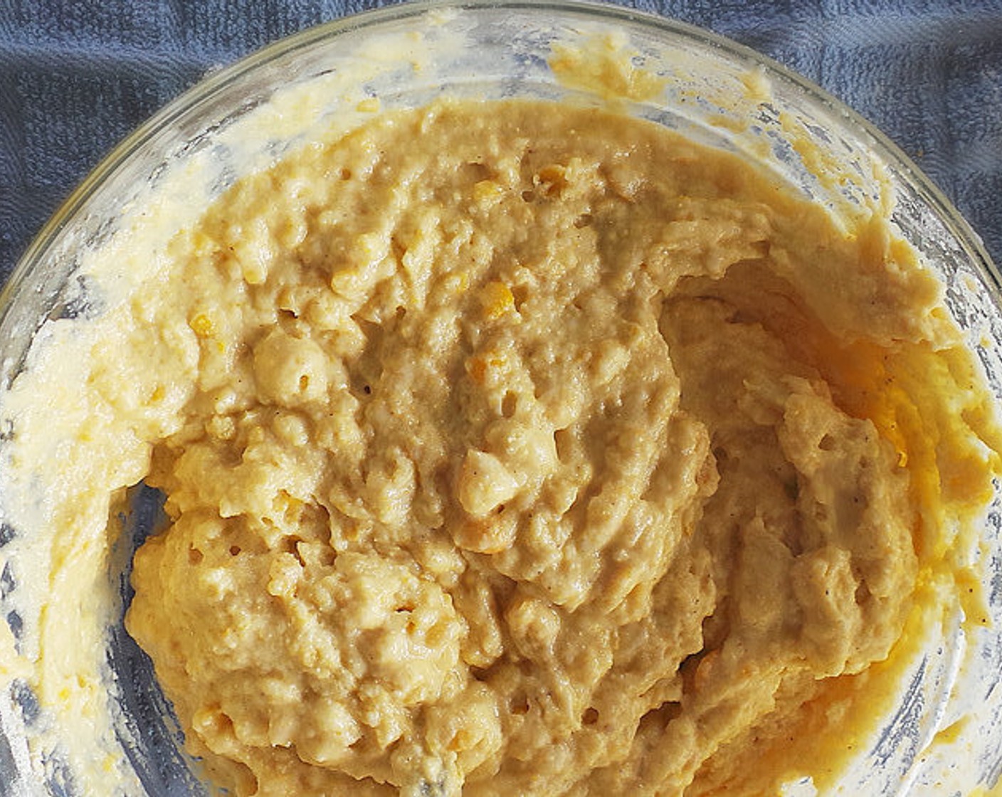 step 3 In a seperate bowl, combine Eggs (3), Creamed Corn (1 can), and Fat-Free Greek Yogurt (3/4 cup) until combined. Add the wet into the dry and gently mix until batter forms.